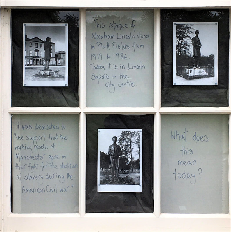 Archive photographs of Lincoln statue in the windows at Platt Hall