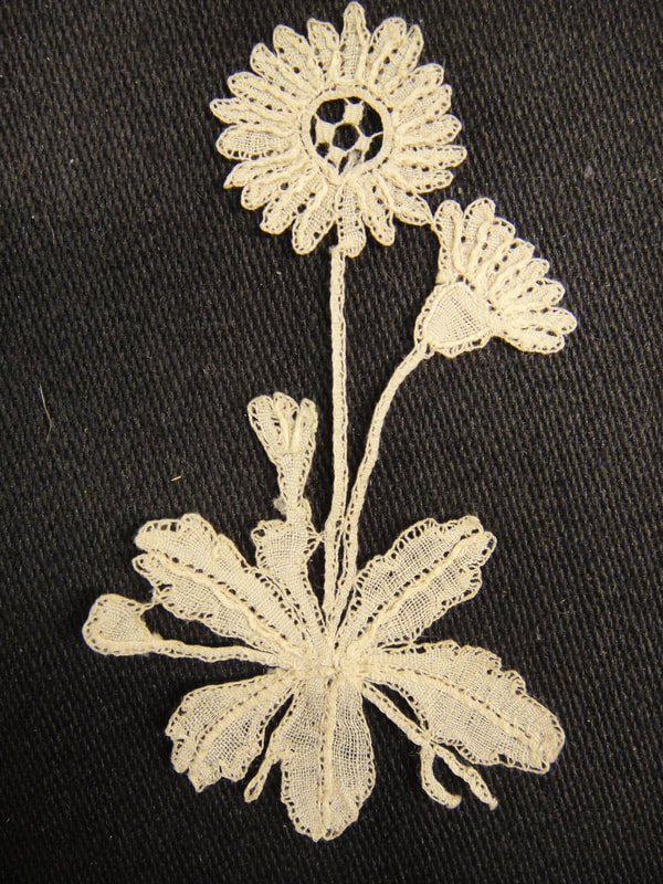 1924.100 Lace daisy, made in Honiton, Devon, 1870-1900