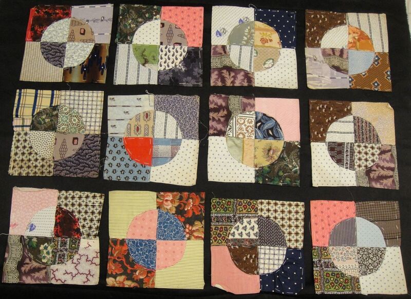 Twelve patchwork pieces in different colours and prints