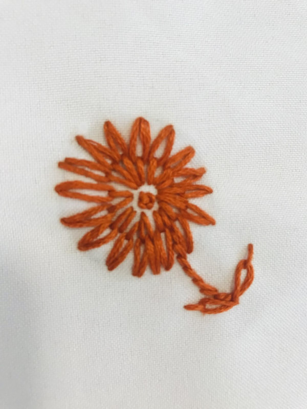 orange stitched flower
