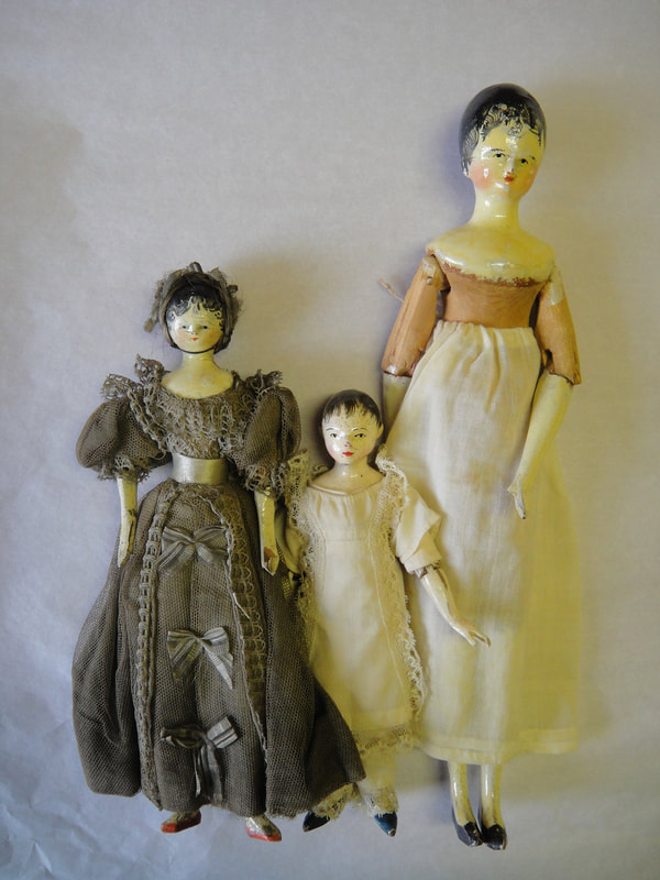 Three wooden dolls, British, 1810-1850, 1922.171, 173 and 174.