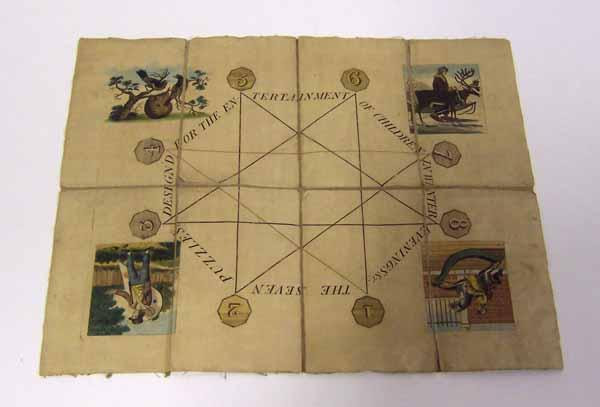 1922.1269 'The Seven Puzzles', board game on cloth-backed paper, c.1880