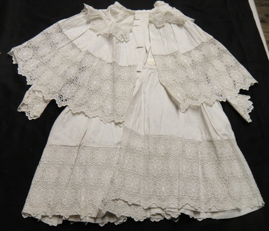 1922.1774 Child's coat, damasked cotton, 1880