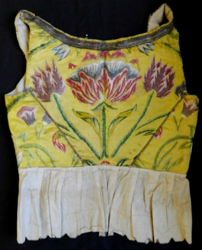 1922.2108 Child's bodice, embroidered satin, Spanish, 1670-1700