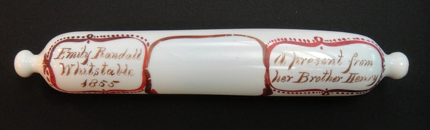 1922.269 Glass rolling pin, inscribed 'Emily Randall, Whitstable, 1855, a present from her brother Henry'