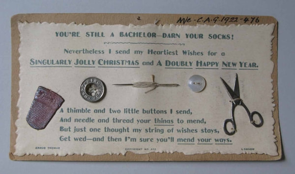 1922.476 Miniature sewing kit and greetings card, British, 1910-1920