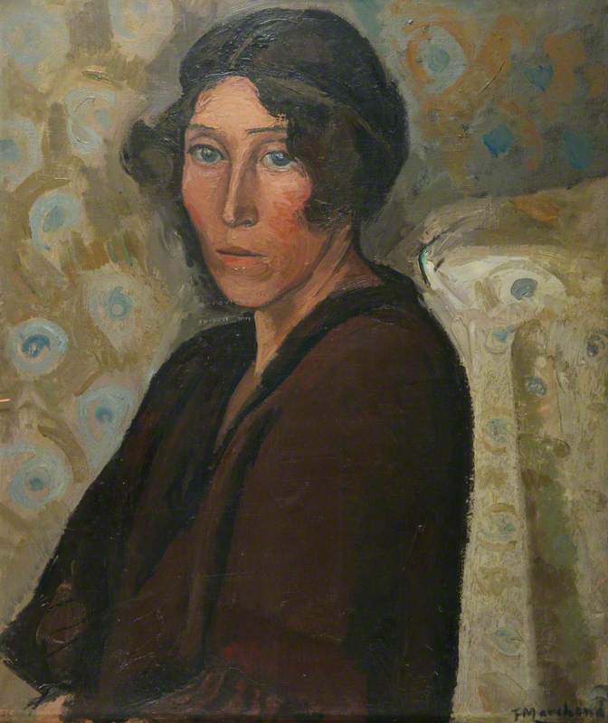 Portrait of a woman dressed in brown against a pale yellow and blue interior.