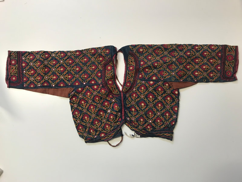 1929.122 Embroidered silk jacket, Indian, date unknown