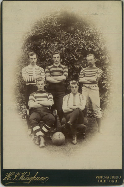 2008.40.6.1778 Cabinet photograph, five men in football kit, photographer unknown, 1900