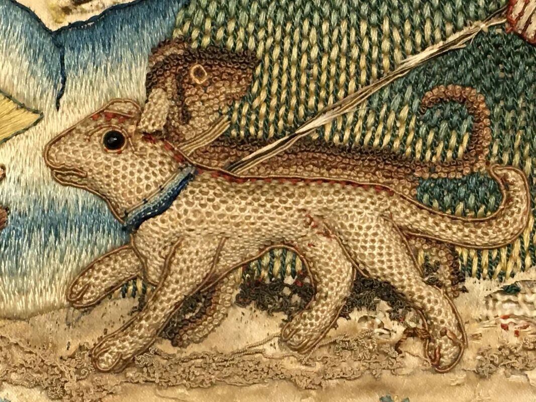 Detail of embroidered stumpwork panel, Venus and Adonis, showing pair of dogs, British, 1660-1680.