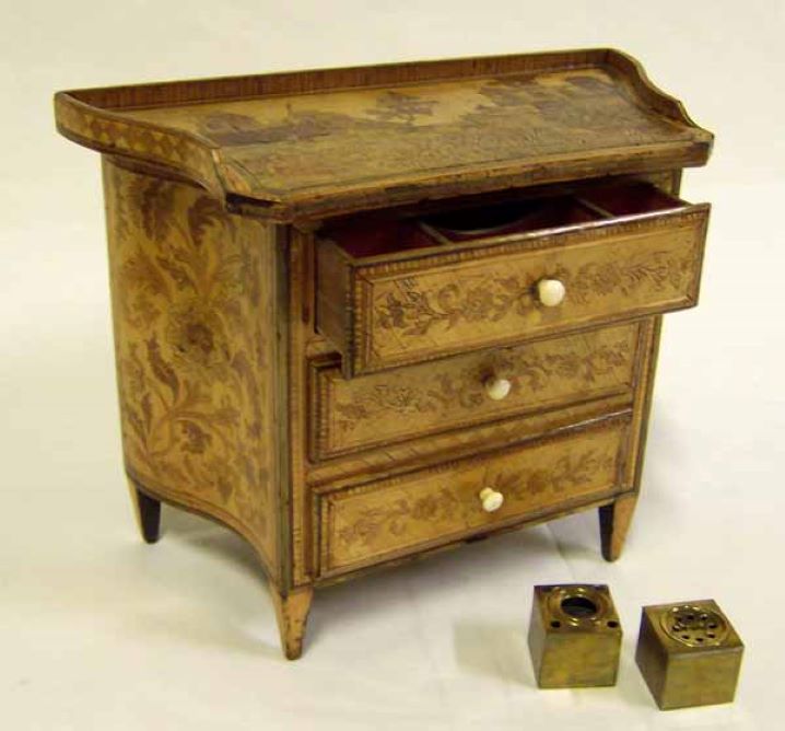 Miniature inkwell in the shape of a chest of drawers