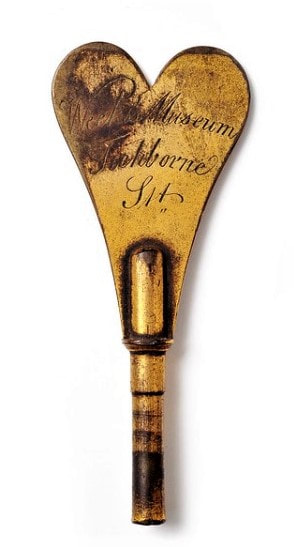 1922.704 Brass key, engraved 'Weeks' Museum, Tichborne Street', c.1797-1810.
