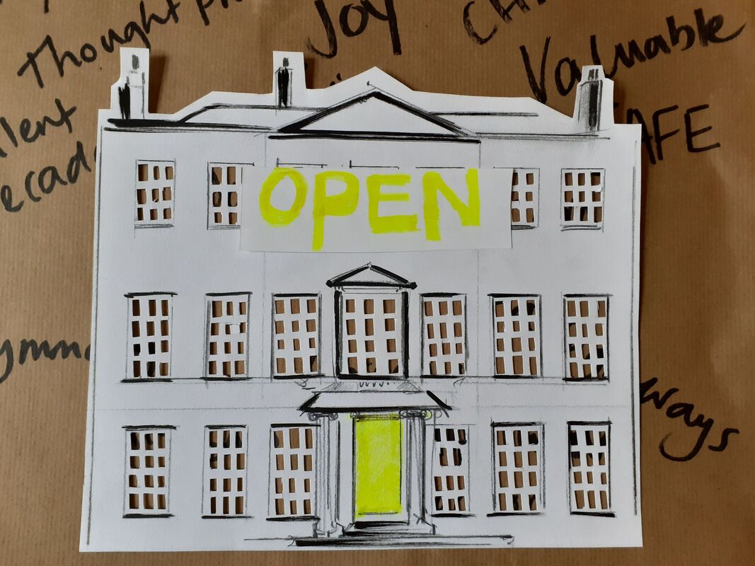 Paper cut out picture of the front of Platt Hall.Picture