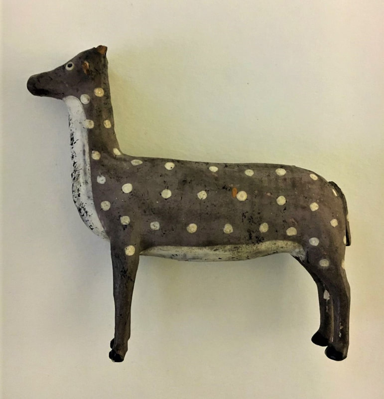 Painted wood Noah's ark animal, possibly a deer, grey with white spots.