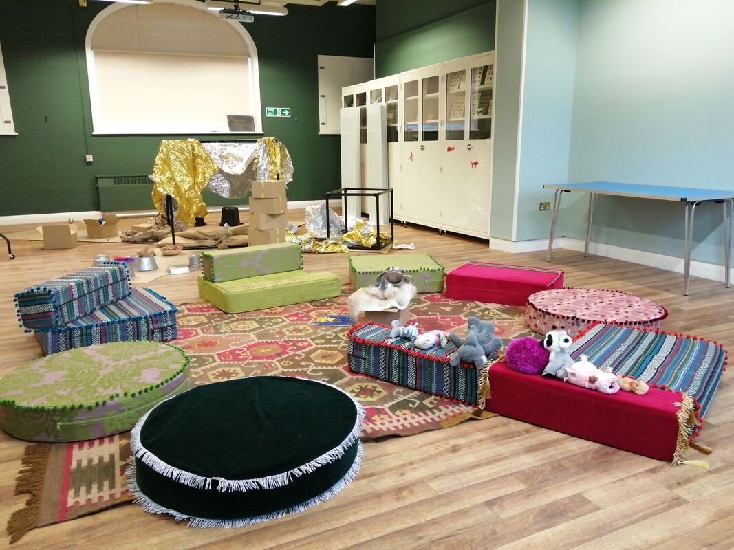 View of the Platt Hall studio set up with cushions and sensory play materials