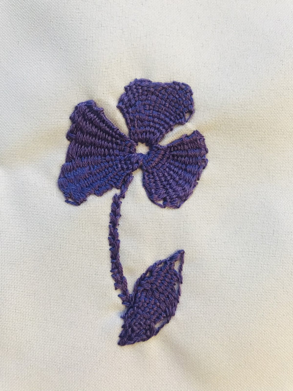 purple stitched flower